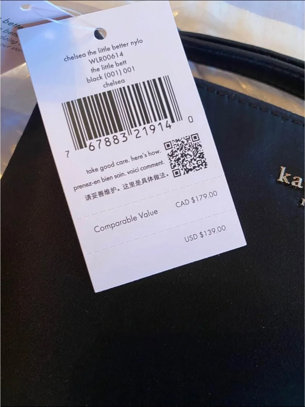 kate spade “Chelsea the Little” black wristlet clutch with gold logo